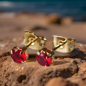 Topo  con piedra cristal rojo y Oro Laminado 