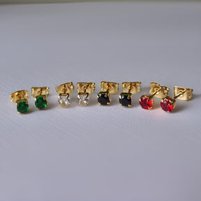 caja de aretes en zirconia y oro  laminado con garantia de por vida